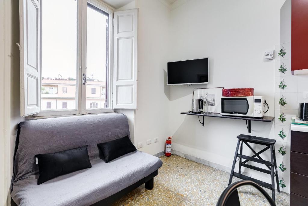 Televízia a/alebo spoločenská miestnosť v ubytovaní VIVILO COLLECTION - San Vito View Apartment - 3 BDR 2 BATHS