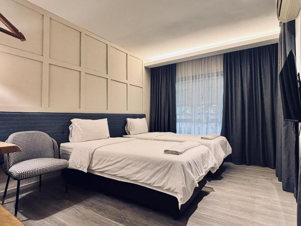 Postel nebo postele na pokoji v ubytování Regent Event & Leisure