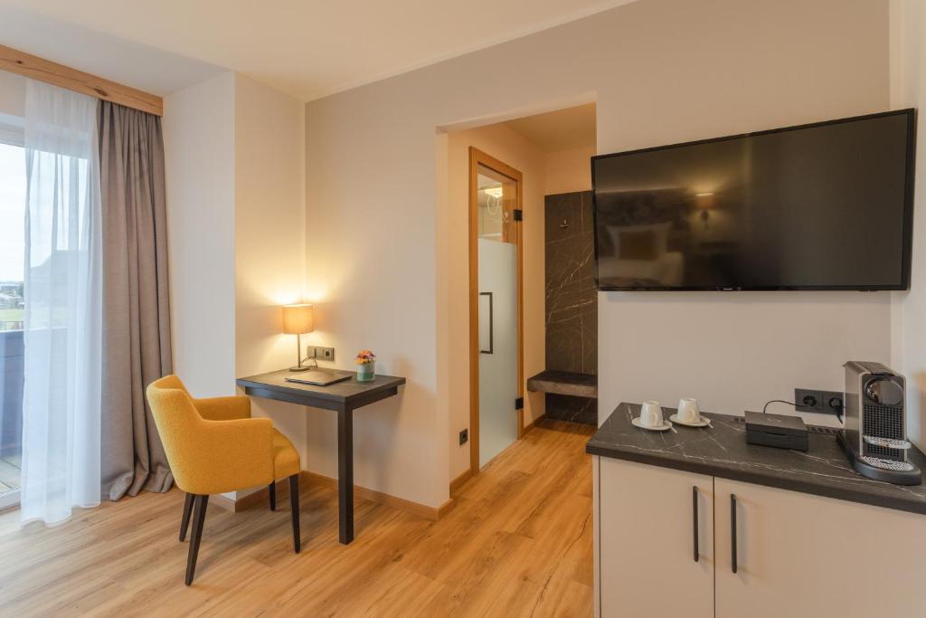 Kuchyň nebo kuchyňský kout v ubytování Natur- und Wohlfühlhotel Kastenholz