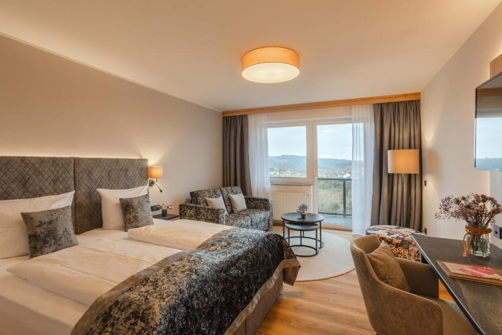 Postel nebo postele na pokoji v ubytování Natur- und Wohlfühlhotel Kastenholz