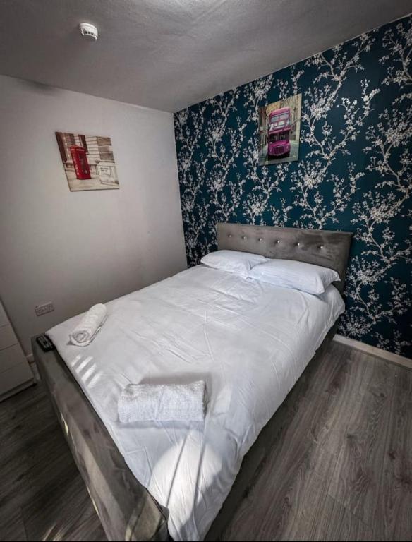 Postel nebo postele na pokoji v ubytování DownTown Delight 2