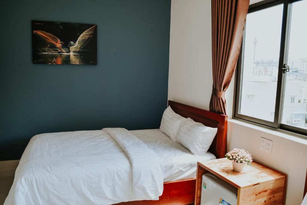 Postel nebo postele na pokoji v ubytování Talofofo Hostel