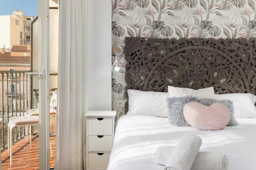 Posteľ alebo postele v izbe v ubytovaní WonderStays Apartamentos Morgan