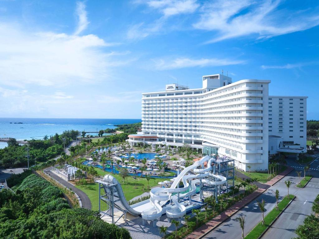 an image of a resort with a water slide at Grand Mercure Okinawa Cape Zanpa Resort in Yomitan