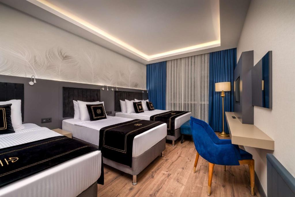 Postel nebo postele na pokoji v ubytování Best Western Premier Hidden Hills Hotel
