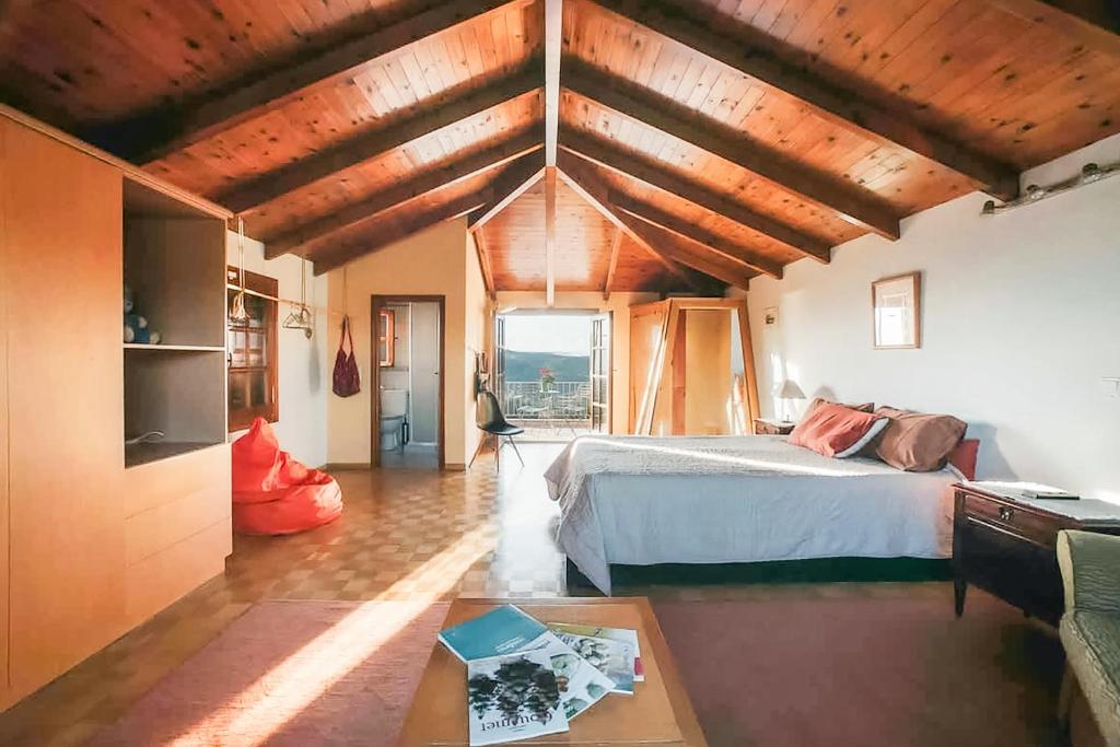 A bed or beds in a room at Villa Oneirama
