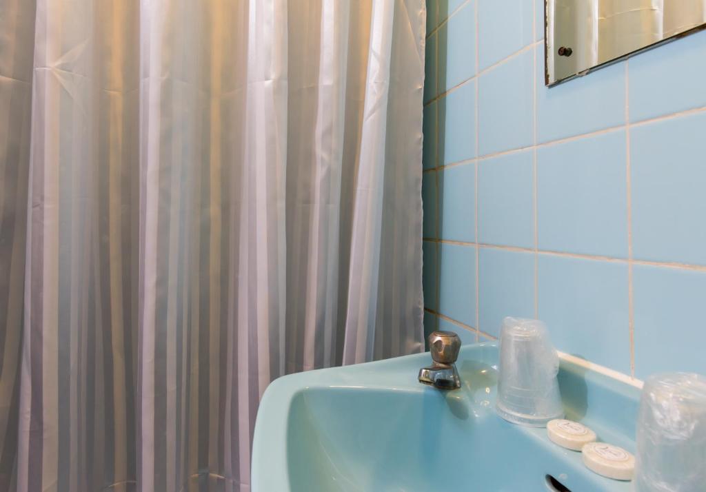 Koupelna v ubytování Aquarius Hotel