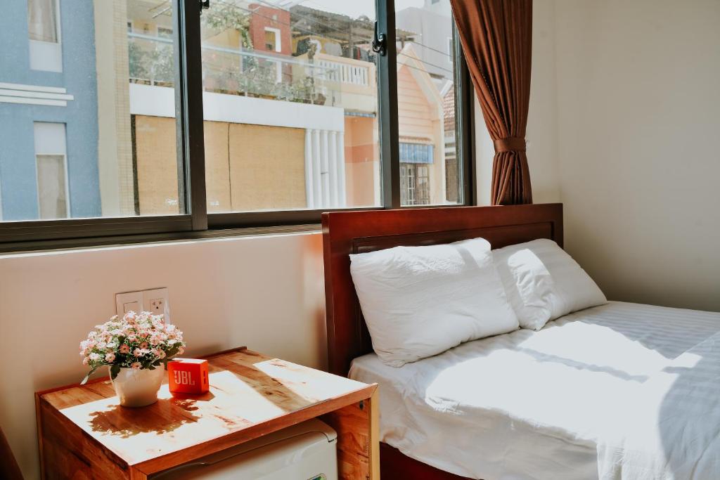 Postel nebo postele na pokoji v ubytování Talofofo Hostel