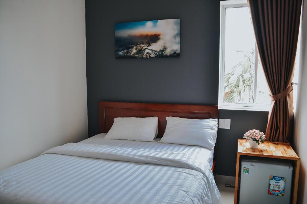 Postel nebo postele na pokoji v ubytování Talofofo Hostel