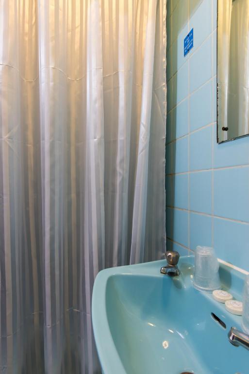 Koupelna v ubytování Aquarius Hotel