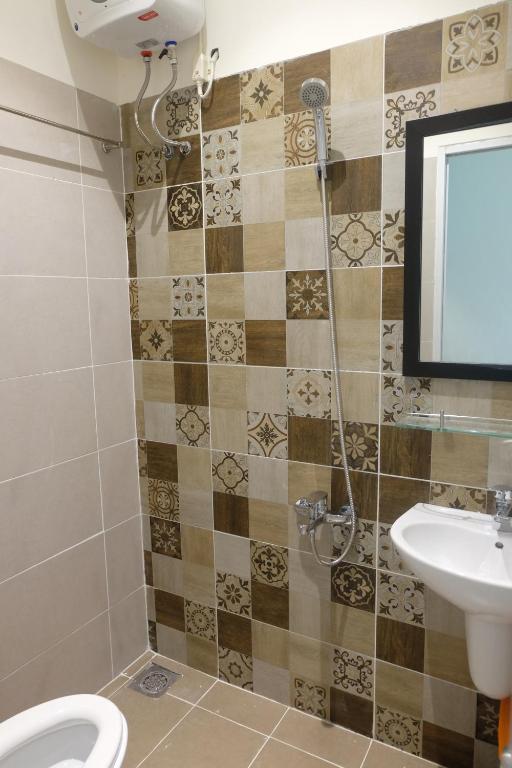 Koupelna v ubytování Talofofo Hostel