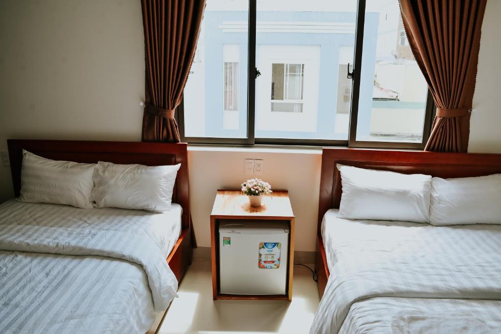 Postel nebo postele na pokoji v ubytování Talofofo Hostel
