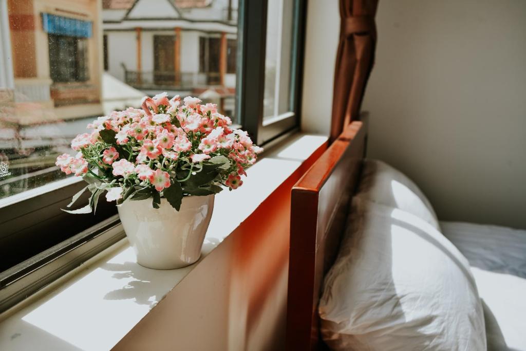 Postel nebo postele na pokoji v ubytování Talofofo Hostel
