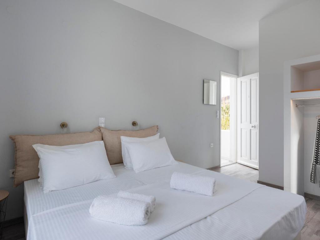 Postel nebo postele na pokoji v ubytování Grozos Rooms