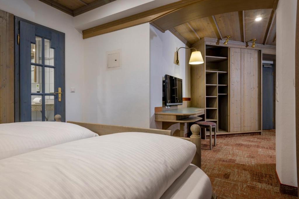 Postel nebo postele na pokoji v ubytování Hotel Promenade