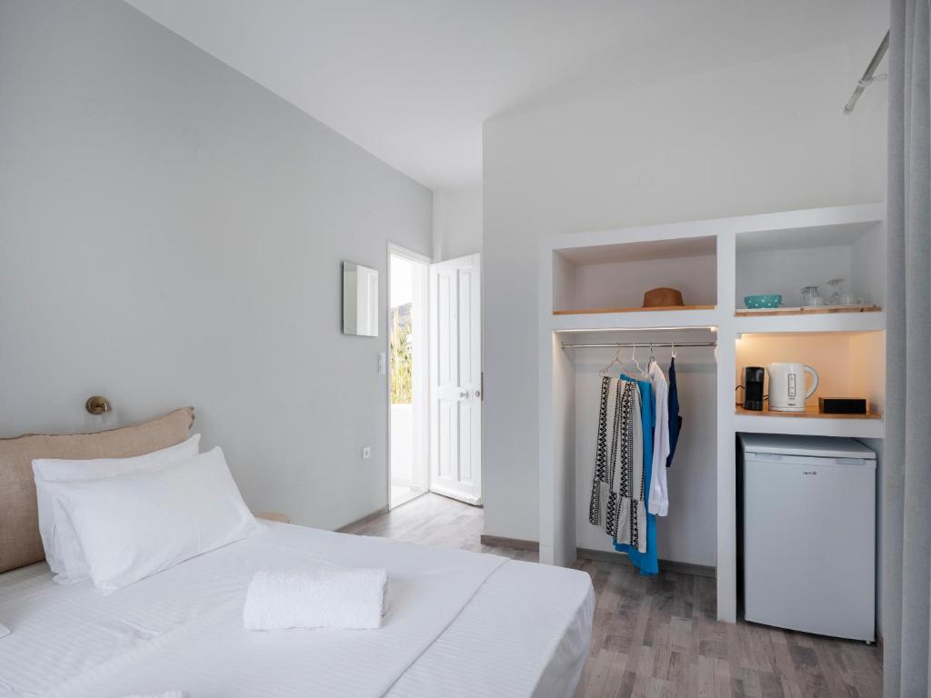 Postel nebo postele na pokoji v ubytování Grozos Rooms