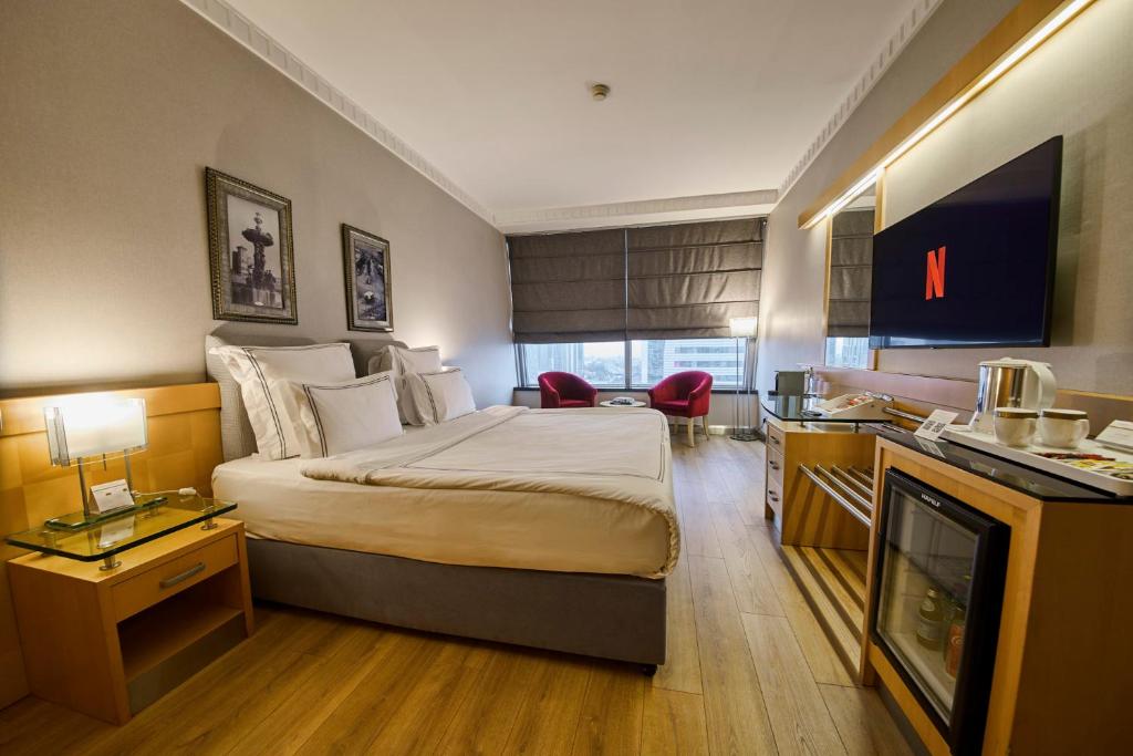 Kuchyň nebo kuchyňský kout v ubytování Metropolitan Hotels Ankara