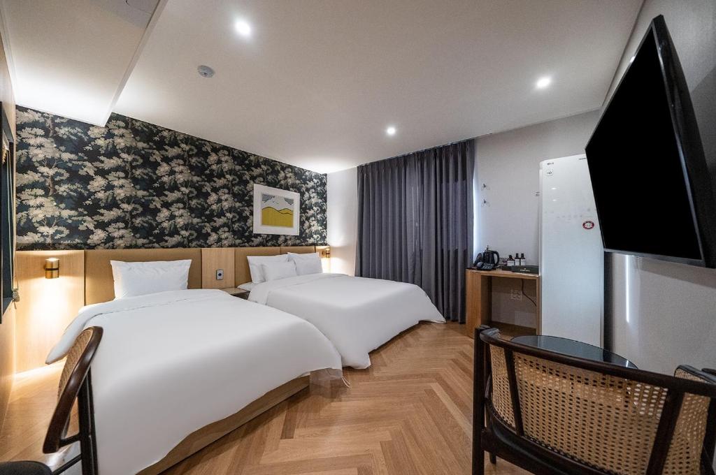 TV a/nebo společenská místnost v ubytování Hound Hotel Songtan