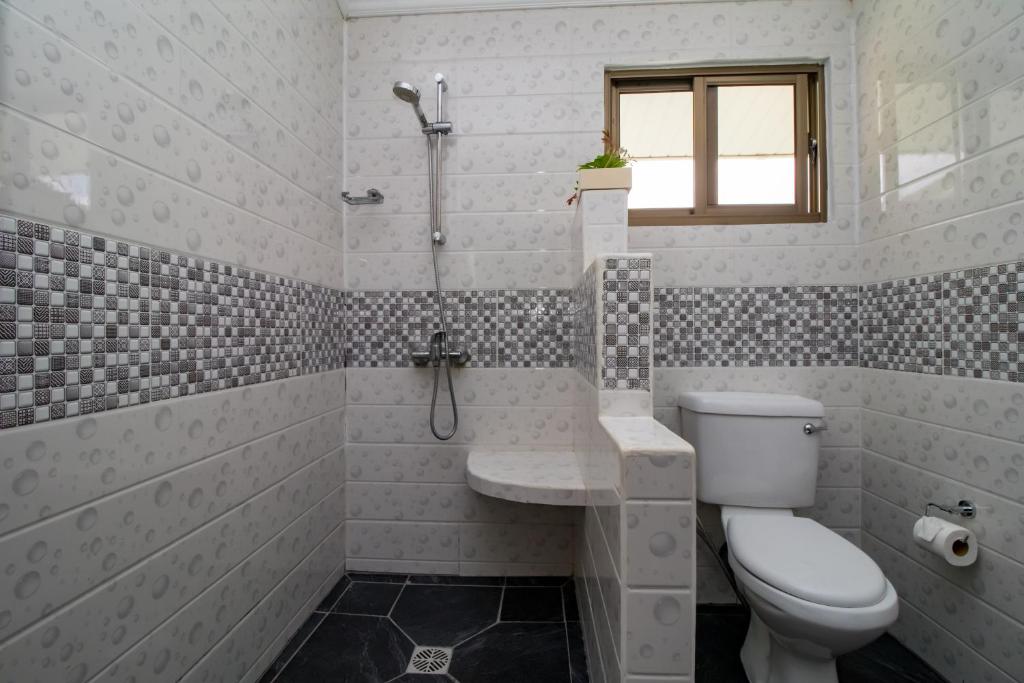 Koupelna v ubytování L'échappée du Cap - Spacious Self Catering Apartment