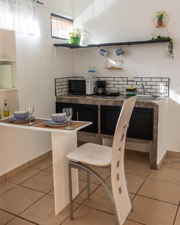 Kuchyň nebo kuchyňský kout v ubytování Casa Esmeralda