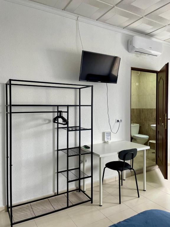 TV a/nebo společenská místnost v ubytování Hostal Kaizen