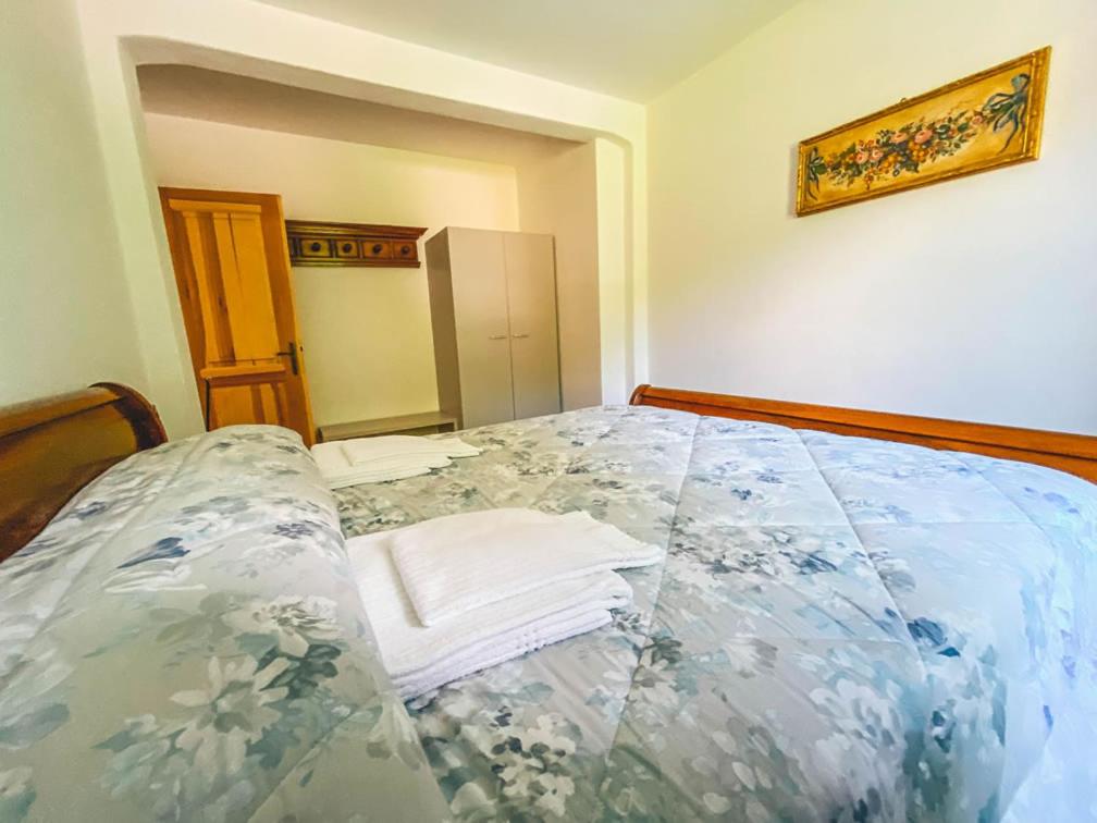 Postel nebo postele na pokoji v ubytování B&B Il Paradiso Mozzio