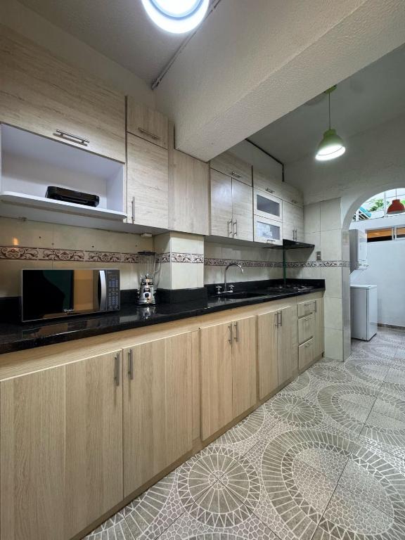 Kuchyň nebo kuchyňský kout v ubytování Hostelfc Javeriana