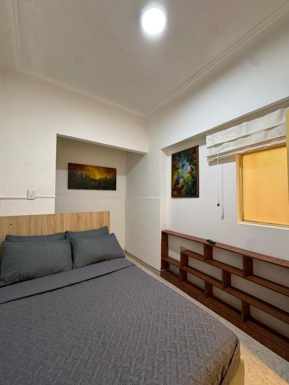 Postel nebo postele na pokoji v ubytování Hostelfc Javeriana