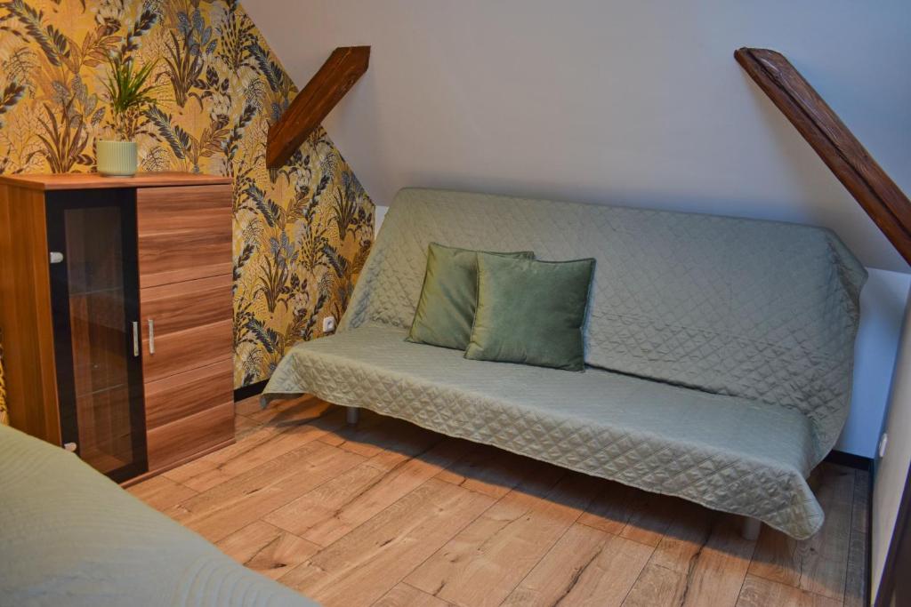 Postel nebo postele na pokoji v ubytování Apartmány pod Prašivou