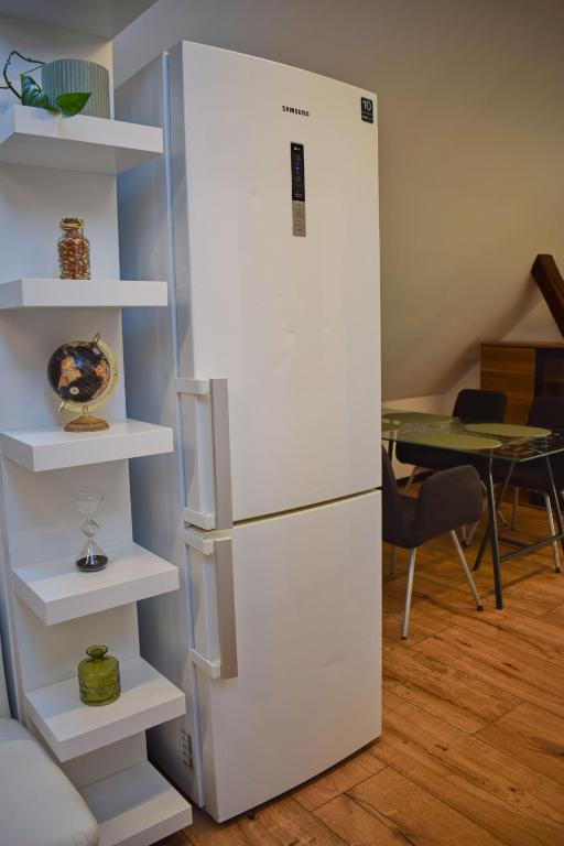 Kuchyň nebo kuchyňský kout v ubytování Apartmány pod Prašivou