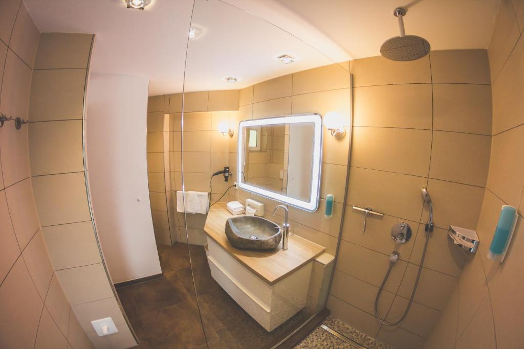 Koupelna v ubytování Rebgarten Hotel Adler