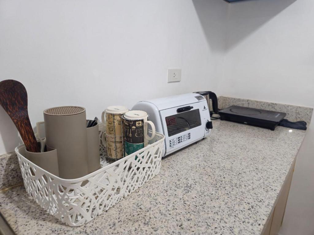 Kuchyň nebo kuchyňský kout v ubytování V- Studio Unit