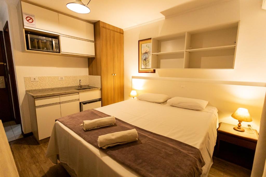 Cama ou camas em um quarto em Hotel Golden Star