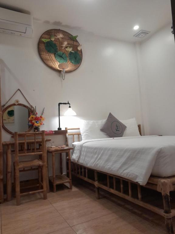 Postel nebo postele na pokoji v ubytování Tâm Homestay