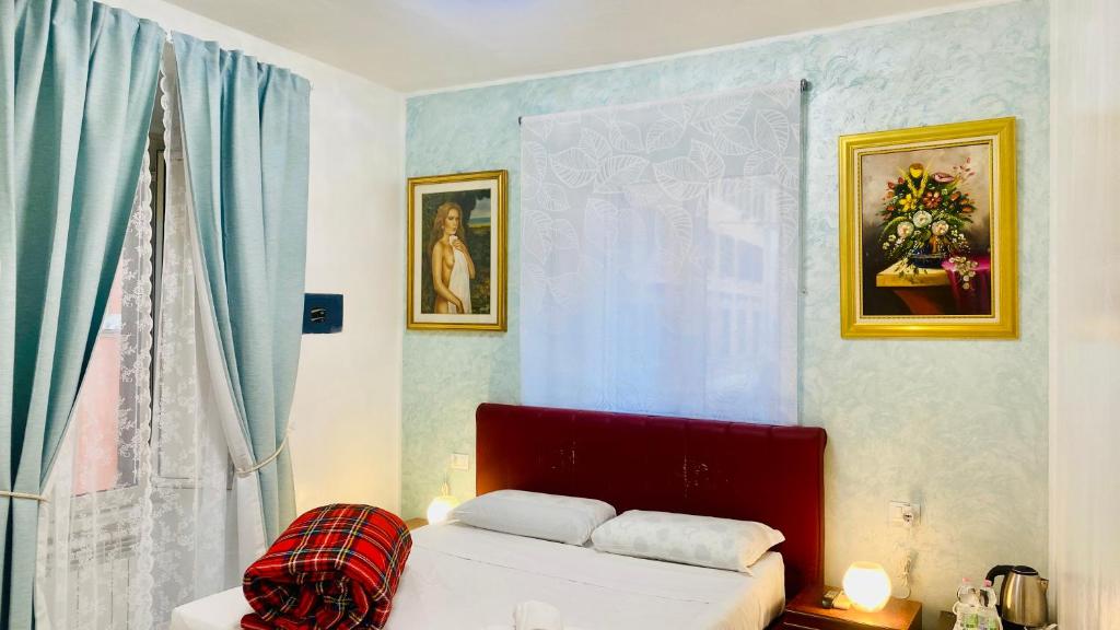 Postel nebo postele na pokoji v ubytování I Dormienti