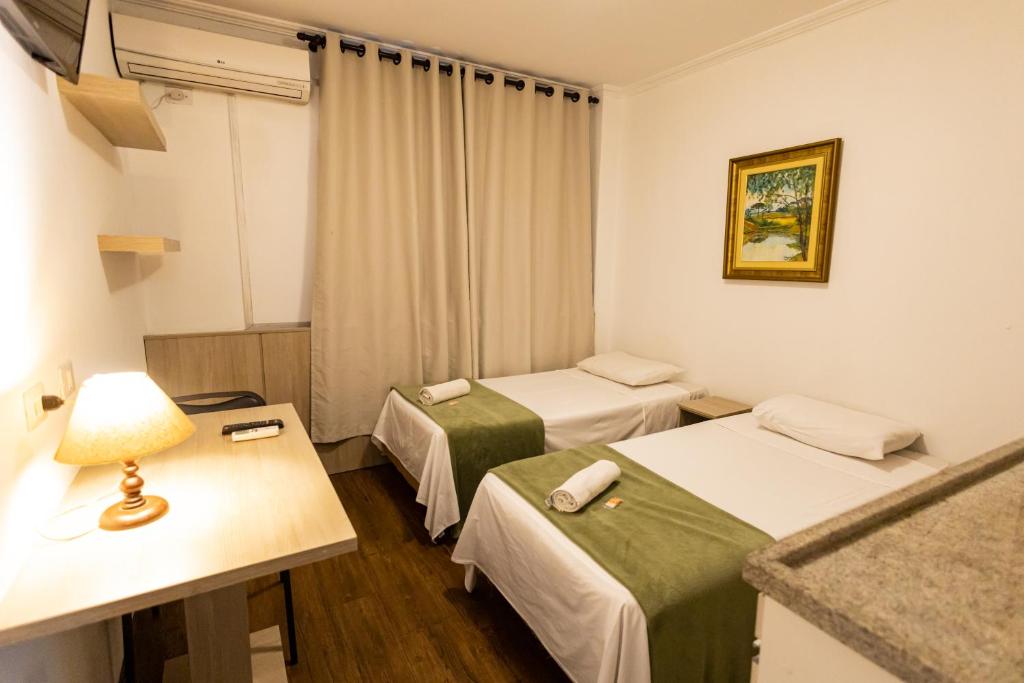 Cama ou camas em um quarto em Hotel Golden Star