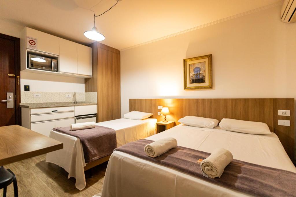 Cama ou camas em um quarto em Hotel Golden Star