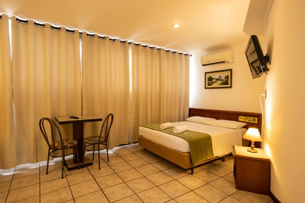 Cama ou camas em um quarto em Hotel Golden Star