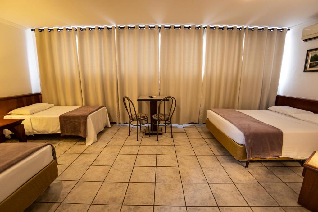 Cama ou camas em um quarto em Hotel Golden Star