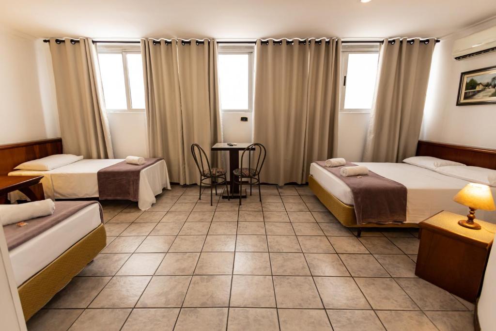Cama ou camas em um quarto em Hotel Golden Star