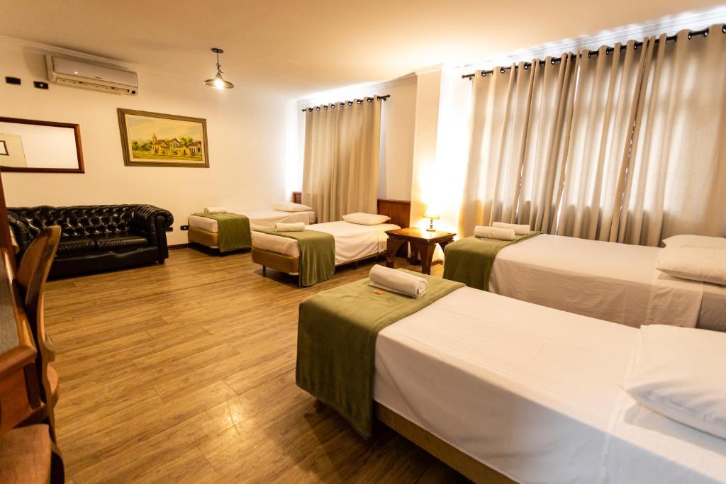 Cama ou camas em um quarto em Hotel Golden Star