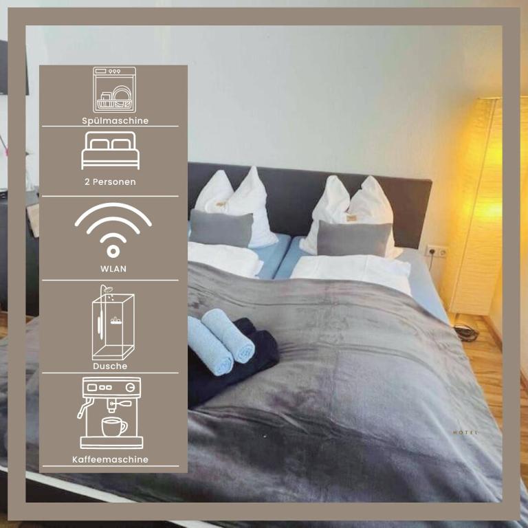 a picture of a bedroom with a bed with white pillows at Nordsee Apartment in Hagen