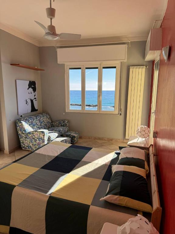Łóżko lub łóżka w pokoju w obiekcie Hotel Ideal