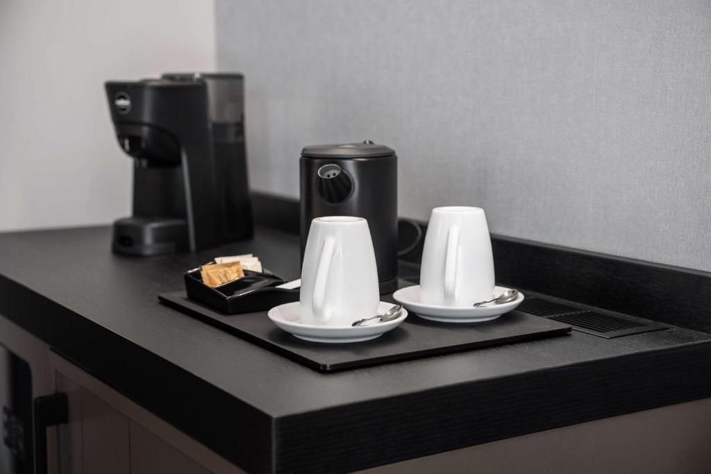 Příslušenství pro přípravu čaje a kávy v ubytování Radisson Blu Hotel, Bergamo ChorusLife