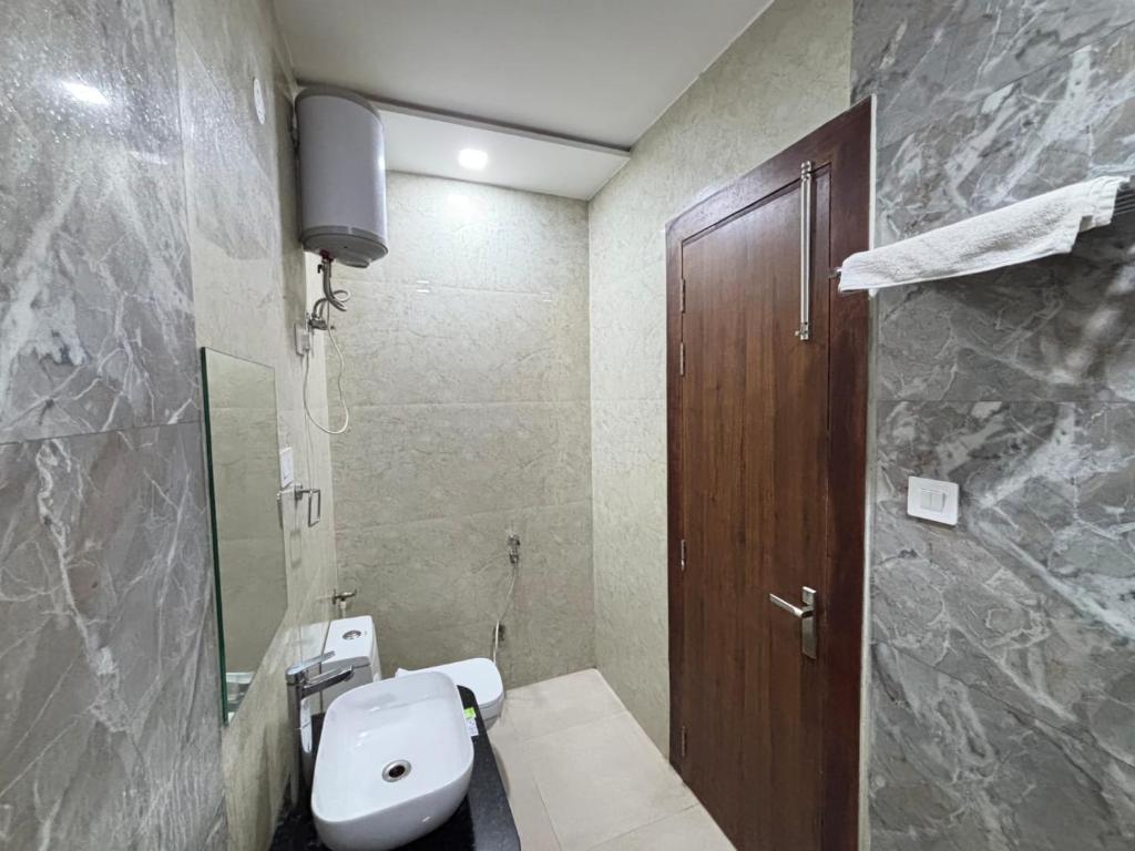 Koupelna v ubytování Hotel Ganga Palace - Agra Dasaprakash Restuarant