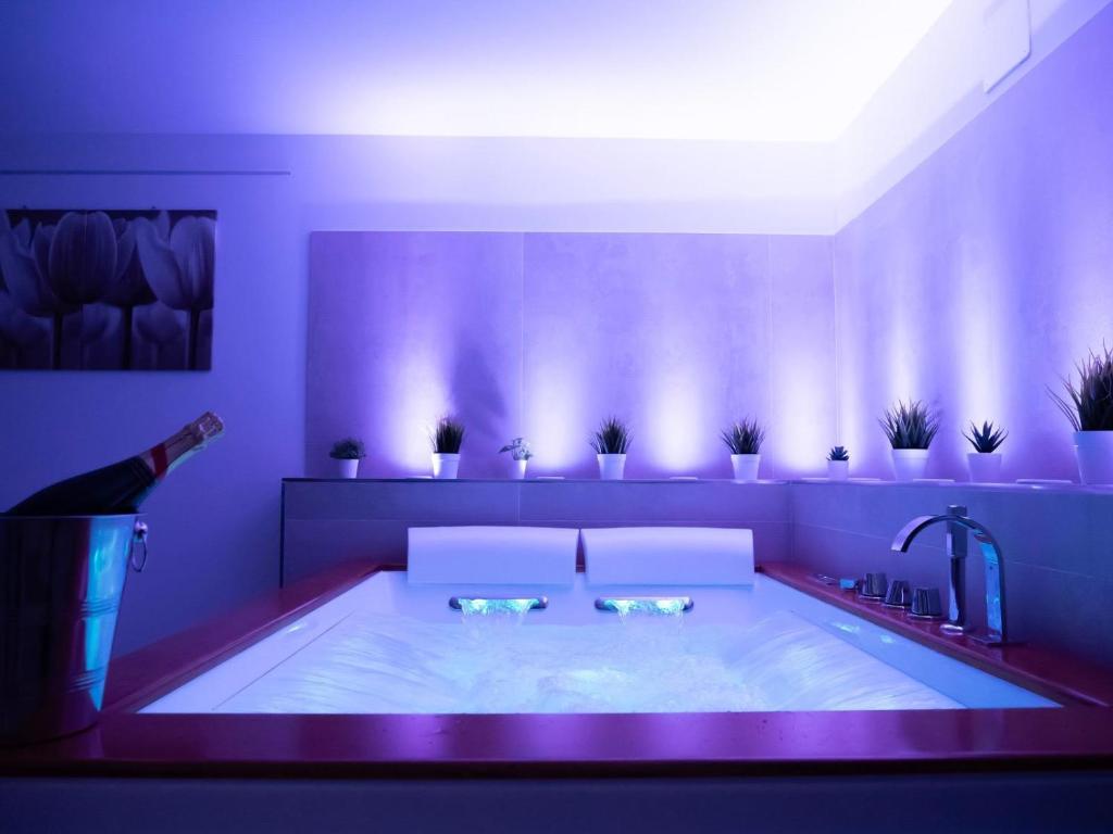 Ένα ή περισσότερα κρεβάτια σε δωμάτιο στο HYDRA Suite