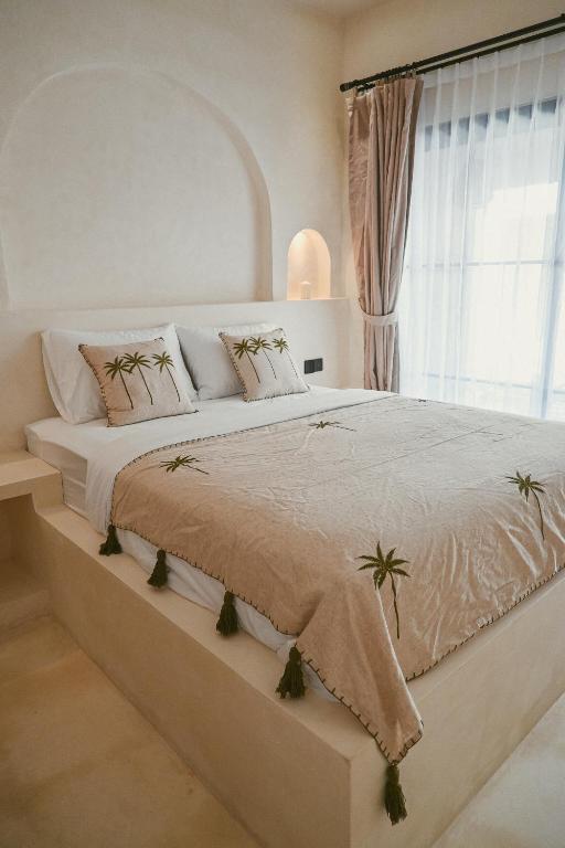 Voodi või voodid majutusasutuse Koa Coco Casa toas