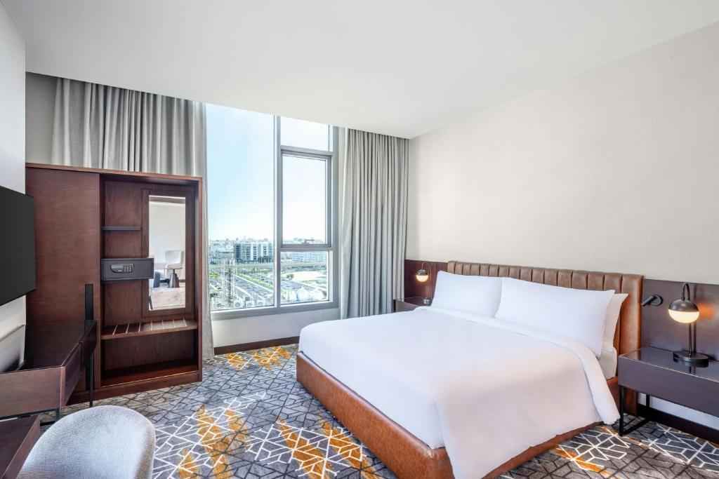 Postel nebo postele na pokoji v ubytování Four Points by Sheraton Jeddah King Fahd Road