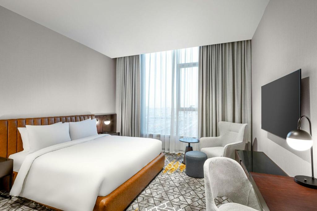 Postel nebo postele na pokoji v ubytování Four Points by Sheraton Jeddah King Fahd Road
