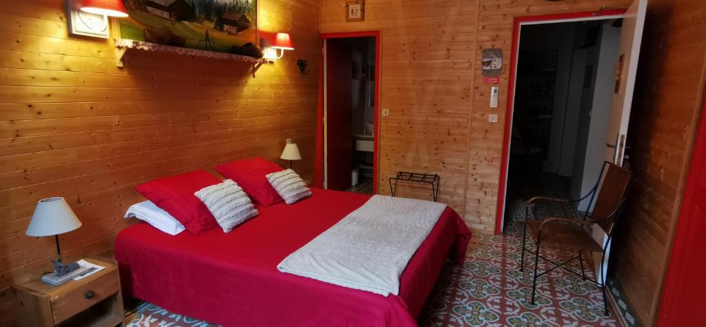 Postel nebo postele na pokoji v ubytování Le Mimosa